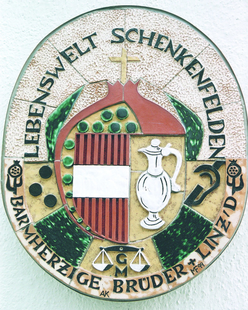 Das Wappen zeigt die Einbettung in die Umwelt der Lebenswelt