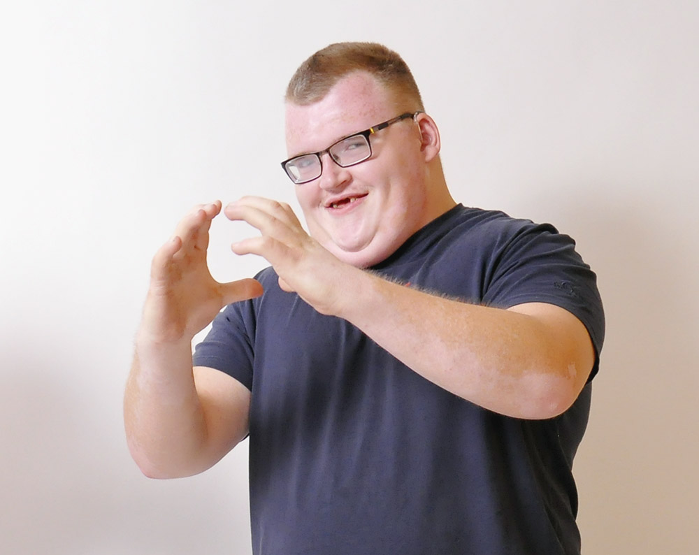 Kommunikationsform hörbeeinträchtigter Menschen