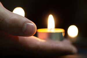 Memorial Day International Holocaust Remembrance Day On Memorial Day, people carry lighted candles.Close up