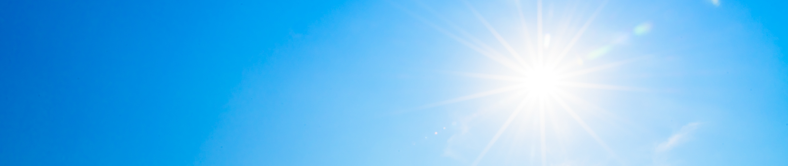 Sun flare on blue sky